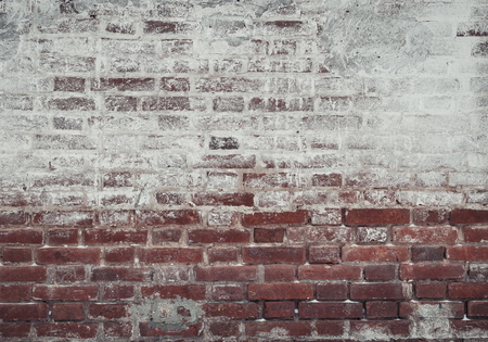 old brick wall of red and white brick, covered with plaster in some places covered with whitewash, grunge design, web design,illustration,bannersの写真素材