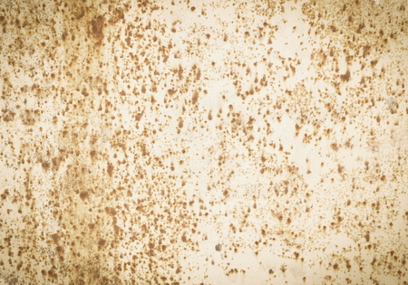 old metal wall garage rust spots flaking paint grunge