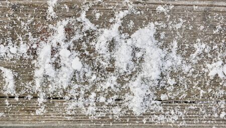 snow on wooden texture backgroundの写真素材