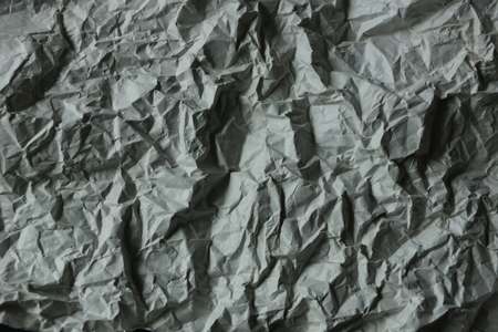 crumpled white paper texture backgroundの写真素材