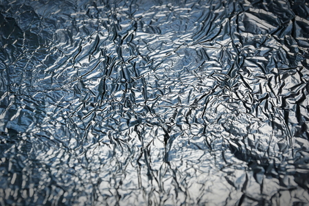 aluminum foil texture background metal shiny surfaceの写真素材