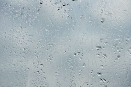 raindrops on the window glass close-up. autumn weather