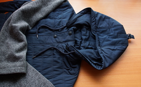 warm blue dark woolen Bolon jacket fabric texture background close-up. season winter autumn spring