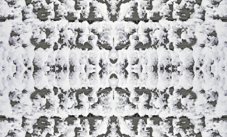 the surface of the snow, waves of wooden fence texture background winter closeupの写真素材