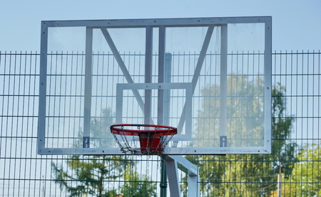 basketball net shield throw the ball on the Playground game play basketball close-up