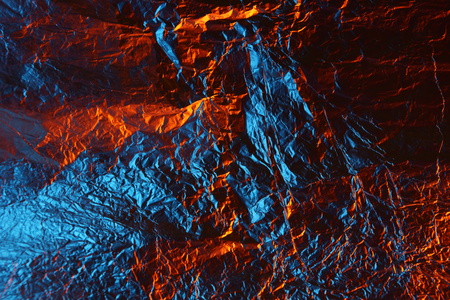 abstract background metal aluminum foil red and blue colorの写真素材