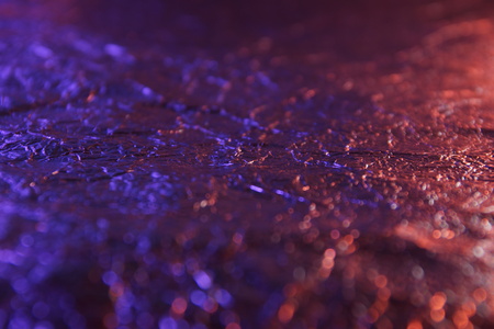 abstract background texture metal aluminum foil red and purple colorの写真素材