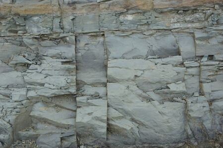 rock surface background texture weathering the ravages of time closeup for decoration design.