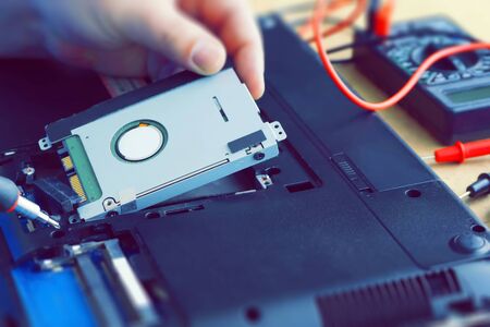 laptop computer repair hard disk replacement diagnostics closeup