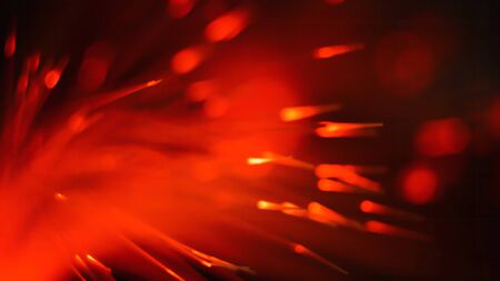 abstract festive background. red arrows flash lines circles blurred background bokeh. Magic Holiday decoration concept.の写真素材