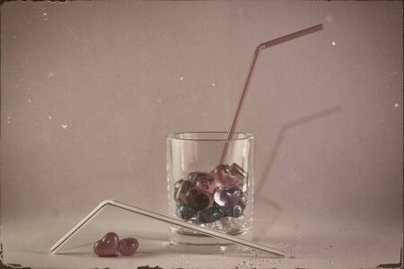 glass of drink loving hearts. Valentine background close upの写真素材