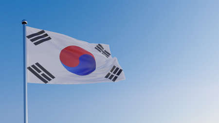 the flag of South Korea in the wind against the blue sky.の写真素材