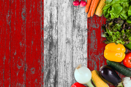 Fresh vegetables from Peru on table. Cooking concept on wooden flag background.の写真素材