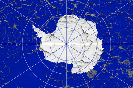 Flag of Antarctica painted on cracked dirty wall. National pattern on vintage style surface.の写真素材