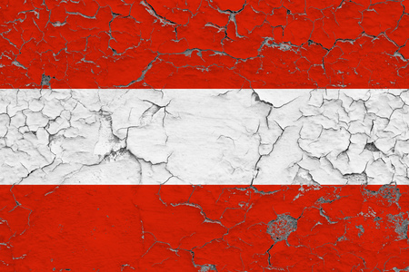 Flag of Austria painted on cracked dirty wall. National pattern on vintage style surface.の写真素材