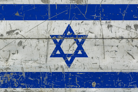 Grunge Israel flag on old scratched wooden surface. National vintage background.の写真素材