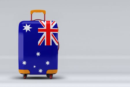 Australia national flag on a stylish suitcases on color background. Space for text. International travel and tourism concept. 3D rendering.の写真素材
