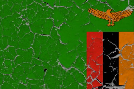 Zambia flag close up grungy, damaged and scratched on wall peeling off paint to see inside surface. Vintage National Concept.の写真素材