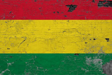 Bolivia flag on grunge scratched concrete surface. National vintage background. Retro wall concept.の写真素材