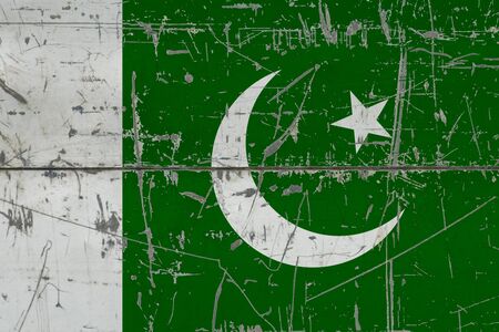 Pakistan flag painted on cracked dirty surface. National pattern on vintage style surface. Scratched...