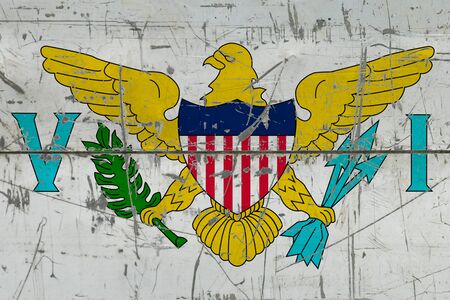 United States Virgin Islands flag painted on cracked dirty surface. National pattern on vintage style surface. Scratched and weathered concept.の写真素材