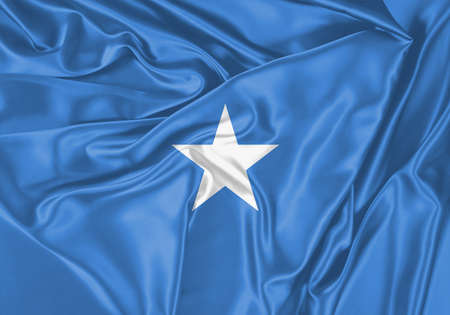 Tajikistan flag waving in the wind. National flag on satin cloth surface texture. Background for international concept.の写真素材