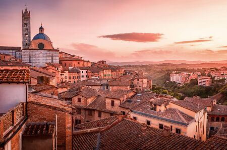 Beautiful amazing view over Siena in Tuscany on a sunset in Italyの写真素材