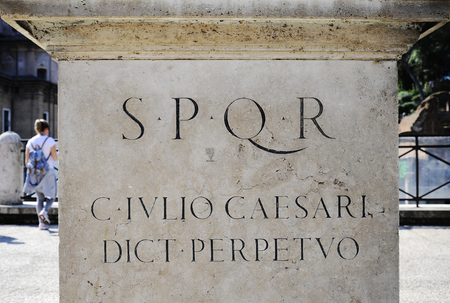 Latin inscription on the statue of Gaius Julius Caesar at the imperial forums of ROME. Gaius Julius Caesar was a Roman politician and military general. Rome, Italyのeditorial素材