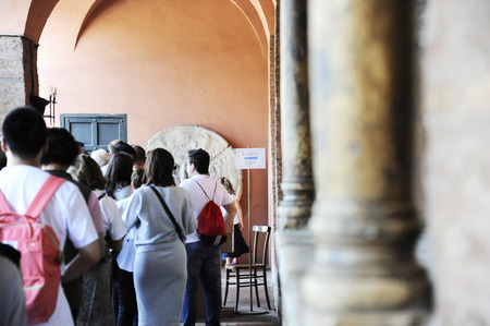 Rome, Italy â October 10, 2018: Visitors waiting to see the mouth of truth (Bocca della VeritÃ ). It attracts visitors who audaciously stick their hand in the mouth. Church of Santa Maria in Cosmedin in Rome, Italyのeditorial素材