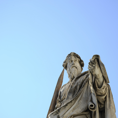 The statue of St. Paul backed by blue sky, Vatican City (Rome, Italy).