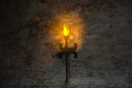 torch on the wall of an old castle  Dubno, Ukraineの写真素材
