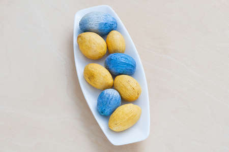 colorful decorative nuts on a plateの写真素材