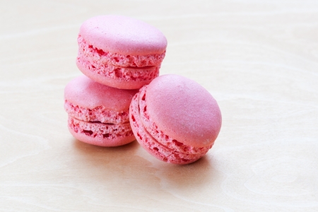 pink macaron on wooden backgroundの写真素材