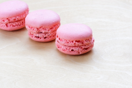pink macaron on wooden backgroundの写真素材