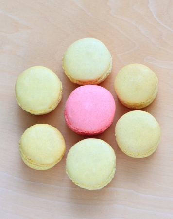 Colorful macaroons on wooden backgroundの写真素材