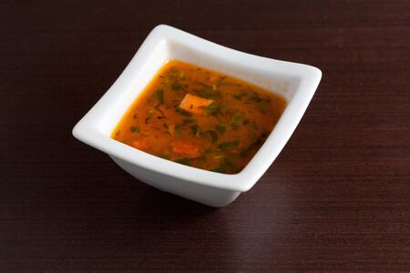 Chicken Soup on wooden tableの写真素材