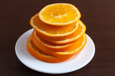orange ring on the plateの写真素材