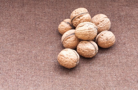 walnuts close up on the burlap backgroundの写真素材