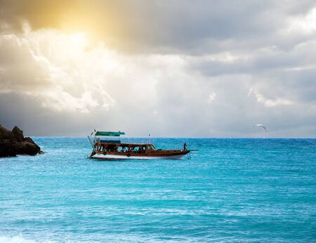 boat in the sea and stormy skyの写真素材