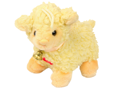soft toy lamb with a bellの写真素材