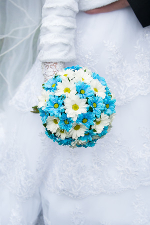 Wedding bouquet in hands of the bride.の写真素材