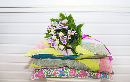Wedding bouquet for bride on the pillows.の写真素材