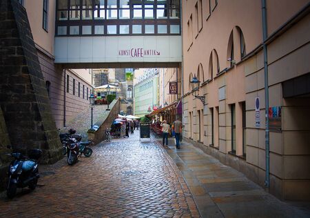 DRESDEN, GERMANY - NOVEMBER 14: People walk along street on MAY 12, 2013 in Dresden, Germany. It is the largest mile of restaurants and bars in Saxon capital.のeditorial素材
