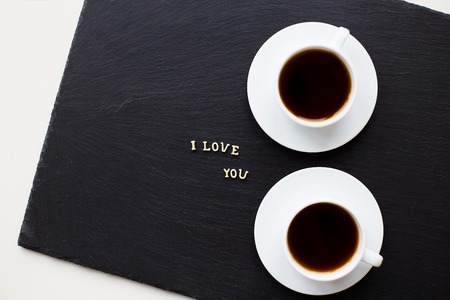 Still Life with a declaration of love. A cup of coffee. Surprise for a loved one.の写真素材