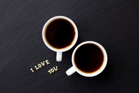 Still Life with a declaration of love. A cup of coffee. Surprise for a loved one.の写真素材