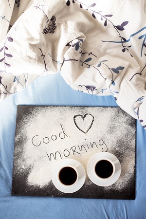 good morning inscription flour on a board-Valentine's day, sunny morningの写真素材