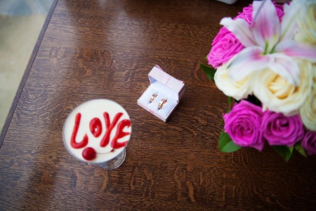 Valentines Day dessert with the words love and cherriesの写真素材