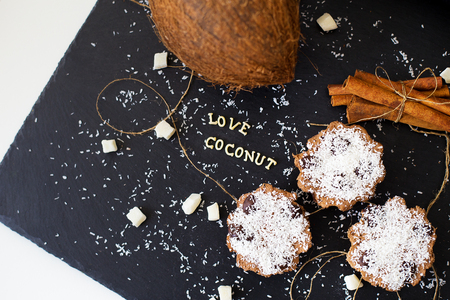 coconut muffins on a black background inscription love coconuts, close-upの写真素材