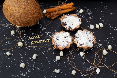 coconut muffins on a black background inscription love coconuts, close-upの写真素材