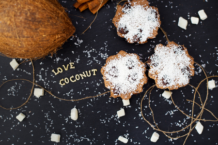 coconut muffins on a black background inscription love coconuts, close-upの写真素材